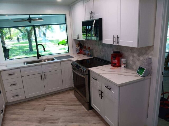 Clean kitchen with black hardware